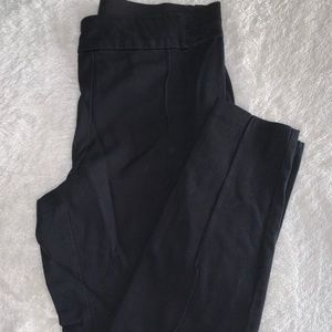 High waisted black slim slacks